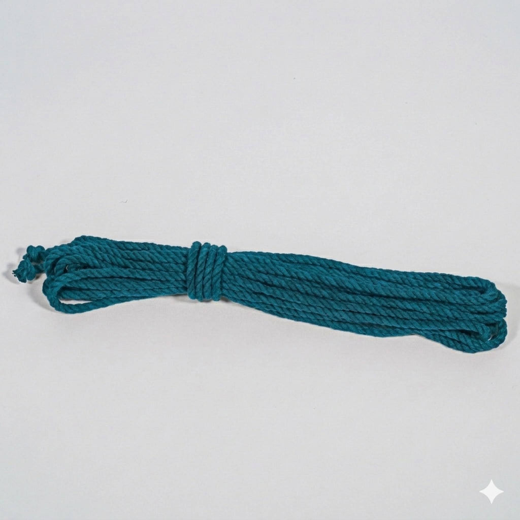 Teal cotton rope on a light gray background